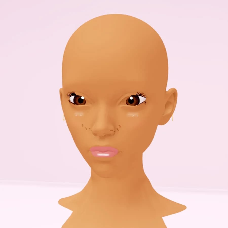 A Makeup Battle head with light freckles, a soft highlight, brown eyes and a nude pink gloss